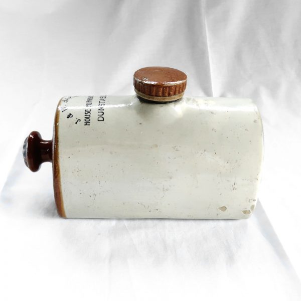 Antique stoneware hot water bottle side view