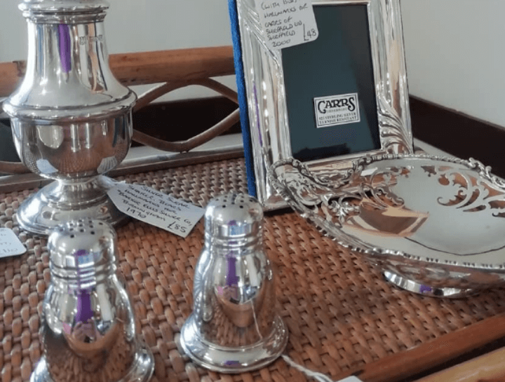 silver photo frame and salt and pepper shakers at woburn antiques and collectors fair