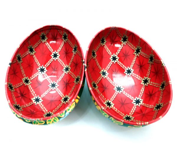 Vintage Metal Egg open showing red patterned interior