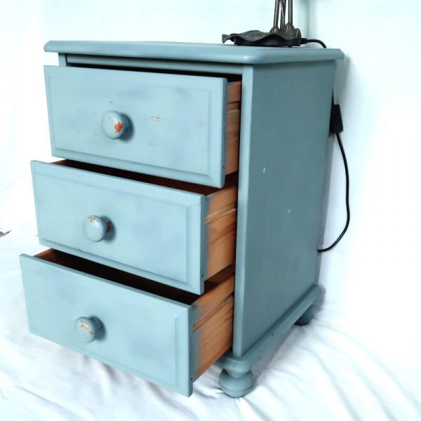 Painted chest of drawers with drawers open