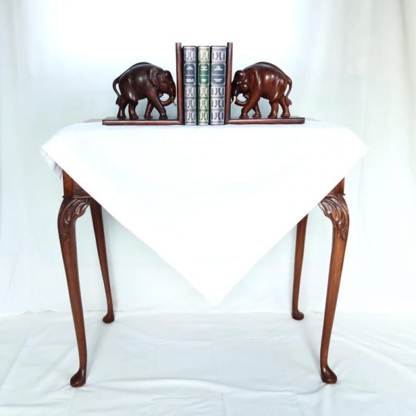 Vintage Elephant Bookends on table
